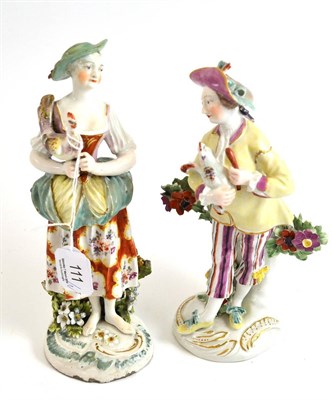 Lot 111 - Two Derby porcelain figures, man and woman, each holding a hen