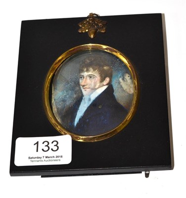 Lot 133 - A miniature of a blue coat