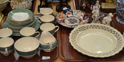 Lot 159 - Creamware platter, Imari dish, pair of German figures, figure of a dog and a tea service