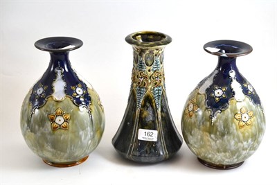 Lot 162 - A pair of Royal Doulton Lambeth stoneware vases and a Continental vase (3)