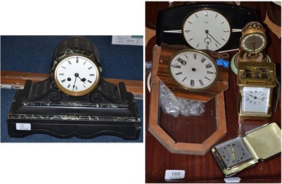 Lot 169 - A black slate mantel clock, ebonised mantel clock, brass carriage timepiece, two other mantel...