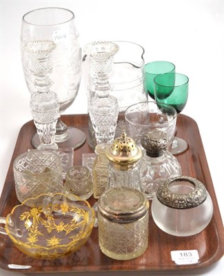 Lot 183 - A tray of glass including an etched glass celery vase, silver topped glass jars, a pair of cut...