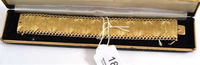 Lot 189 - A 9ct gold decorative panel bracelet