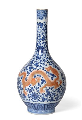 Lot 177 - A Chinese Porcelain Bottle Vase, Qianlong reign mark, painted in underglaze blue, iron red and gilt