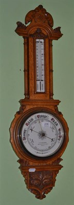 Lot 236 - Light oak wheel barometer signed H Cousens, Hull