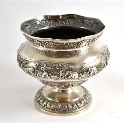 Lot 250 - An Anglo Indian silver bowl on pedestal foot, engraved with hunting scenes