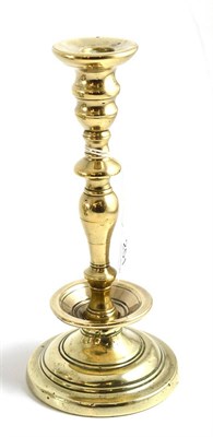 Lot 251 - 18th century brass candlestick