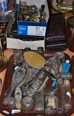 Lot 254 - A quantity of silver and silver plate including silver backed brushes, silver topped jars, horn...