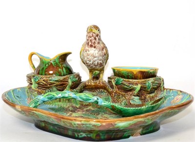 Lot 189 - A George Jones Majolica Strawberry Set, circa 1870, the dish of shaped oval form with bird...