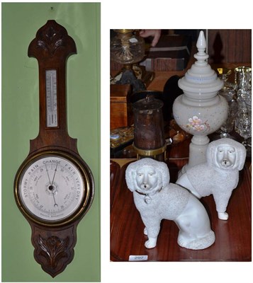 Lot 292 - An oak cased barometer, miner's lamp, pair of poodles and an opaque glass vase and cover