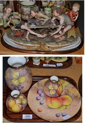 Lot 306 - A Capodimonte figure group, three fruit study painted vases and a plate