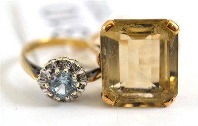 Lot 310 - A blue zircon and diamond cluster ring and a quartz ring