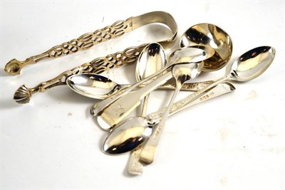 Lot 313 - A pair of silver tongs, a sauce ladle and six coffee spoons