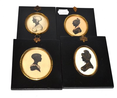 Lot 339 - Four portrait miniatures depicting ladies