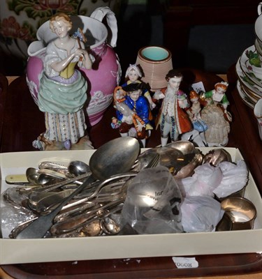 Lot 364 - A tray including match striker, china figurines, a quantity of silver and plated flatware,...