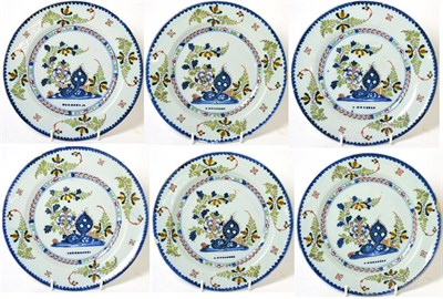 Lot 199 - A Set of Six English Delft Plates, probably London, circa 1740, painted in colours with flowers and