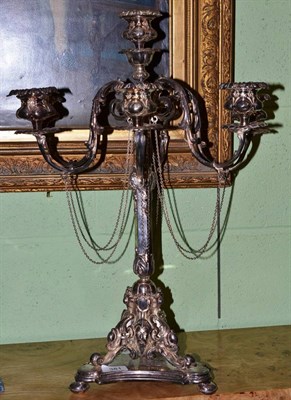 Lot 381 - A good 19th century silver plated six branch candelabra with mask motifs and chain decoration