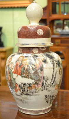 Lot 384 - A large Japanese pottery vase and cover