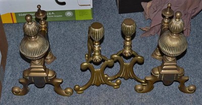 Lot 389 - Two pairs of brass fire dogs