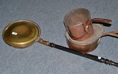 Lot 406 - A 19th century copper pan, a copper pan and cover and a warming pan