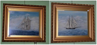 Lot 496 - Pair of oils racing yachts, P Cook