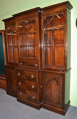 Lot 519 - A mahogany break front bookcase