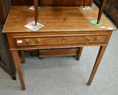 Lot 522 - A George III oak and mahogany crossbanded side table