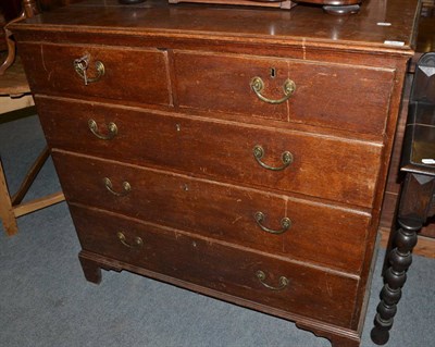 Lot 527 - An oak and pine five drawer straight fronted chest of drawers