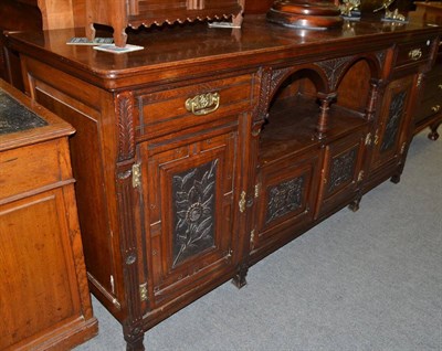 Lot 536 - A late Victorian carved walnut sideboard