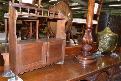 Lot 537 - A copper coal scuttle, a plant stand and a wall cabinet