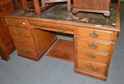 Lot 539 - A late Victorian oak double pedestal desk with Hobbs & Co brass locks