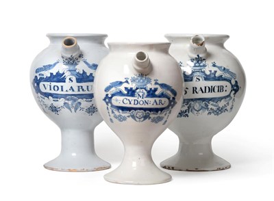 Lot 222 - A Matched Set of Three Dutch Delft Wet Drug Jars, circa 1720, of ovoid form with loop handles,...