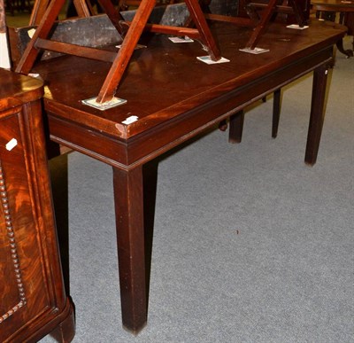 Lot 547 - A late 18th century mahogany serving table with square chamfered legs