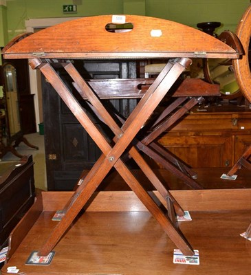 Lot 558 - A mahogany and brass bound butler's tray on stand