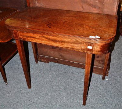 Lot 560 - A George III mahogany tea table