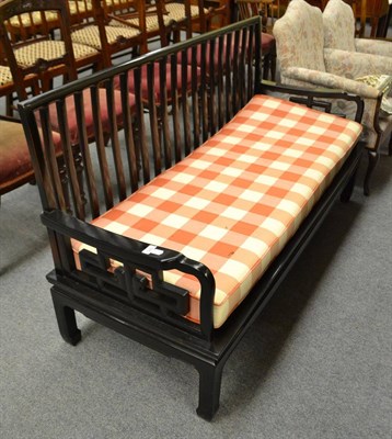 Lot 575 - A Chinese hardwood sofa