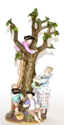 Lot 229 - A Meissen Porcelain Figure Group of the Apple Pickers, circa 1880, with a boy climbing a ladder...