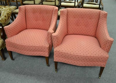 Lot 577 - A pair of pink upholstered armchairs, circa 1900, on square tapering legs