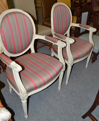 Lot 582 - A pair of grey painted open armchairs