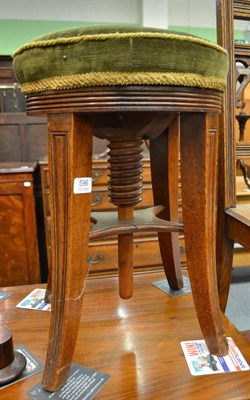 Lot 596 - A Victorian mahogany revolving piano stool