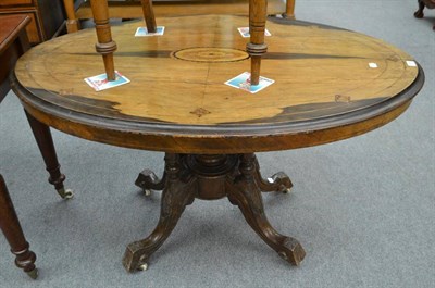 Lot 599 - A Victorian walnut oval breakfast table