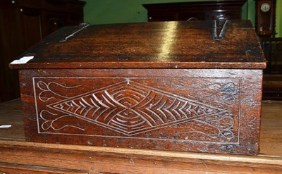 Lot 607 - A carved oak bible box