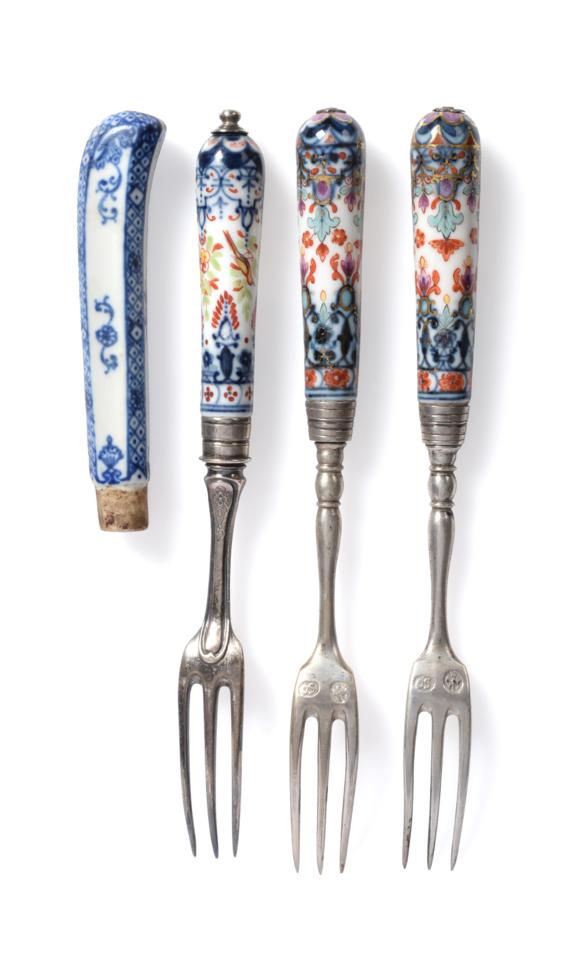 Lot 234 - A Pair of French Porcelain-Handled Dessert Forks, probably St Cloud, circa 1730, of tapering...