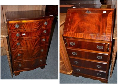 Lot 621 - A reproduction mahogany five drawer chest and a reproduction mahogany bureau