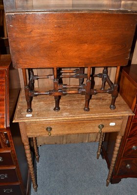 Lot 622 - A 1920s oak side table and a mahogany Sutherland table