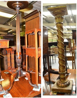 Lot 627 - A gilt plant pedestal with spiral turned column and a mahogany torchere with reeded support