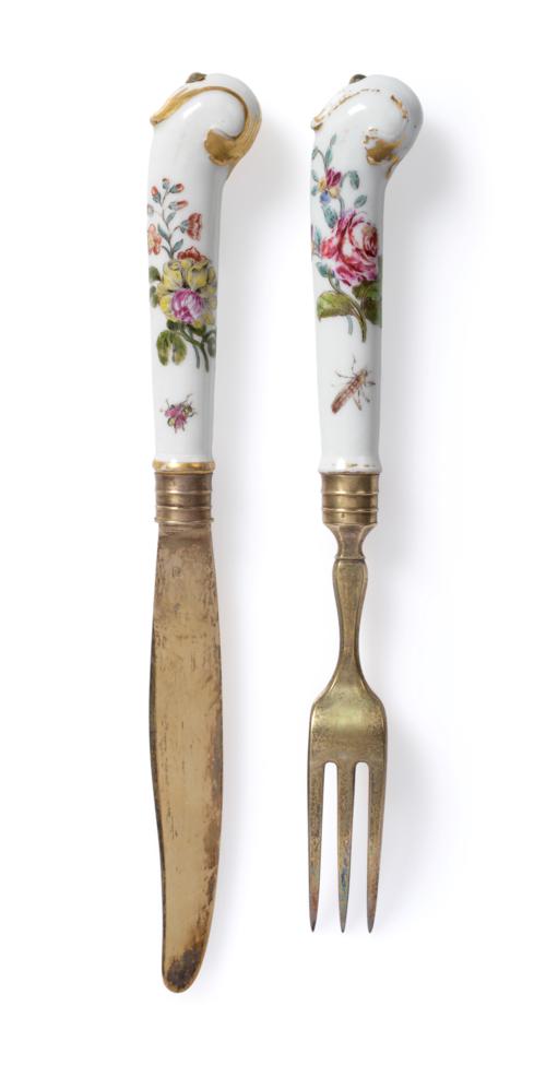 Lot 236 - A Chelsea Porcelain-Handled Dessert Knife and Fork, circa 1755, painted with insects and...