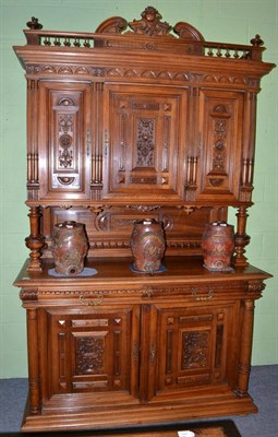 Lot 648 - A Victorian carved walnut sideboard