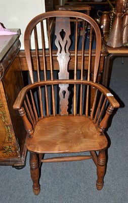 Lot 650 - A 19th century oak and elm high back Windsor armchair