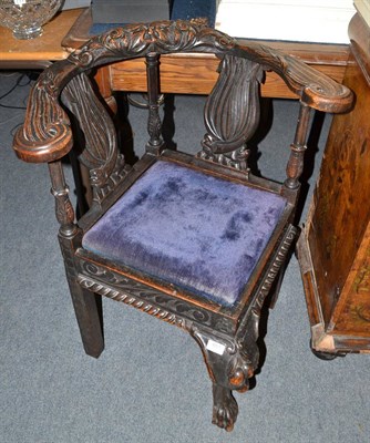 Lot 651 - Victorian carved oak corner chair